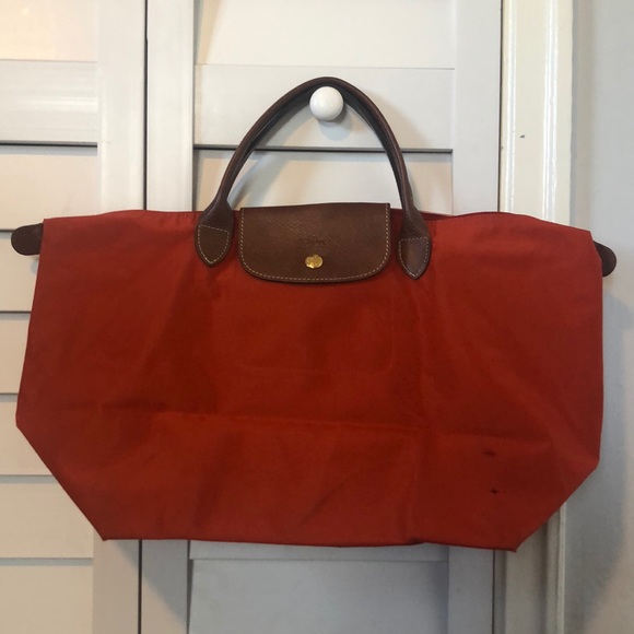 how to fold longchamp bag